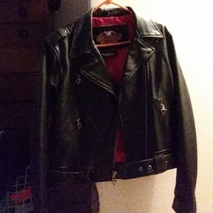 A worn twice woman's harley davidson jacket